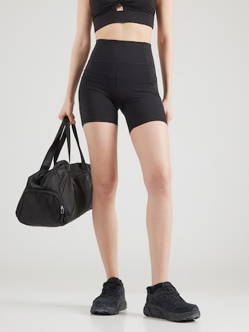 Skinny Pantaloni sport de la Fabletics pe negru: față