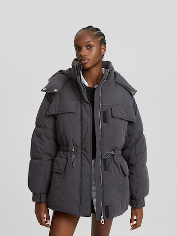 Bershka Winter Jacket in Grey: front