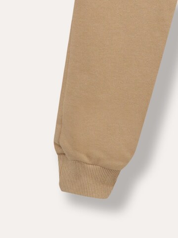 WINKIKI Regular Pants in Beige