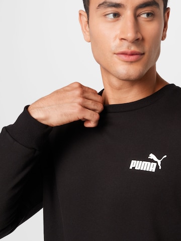 PUMA Sportovní mikina 'Essentials' – černá