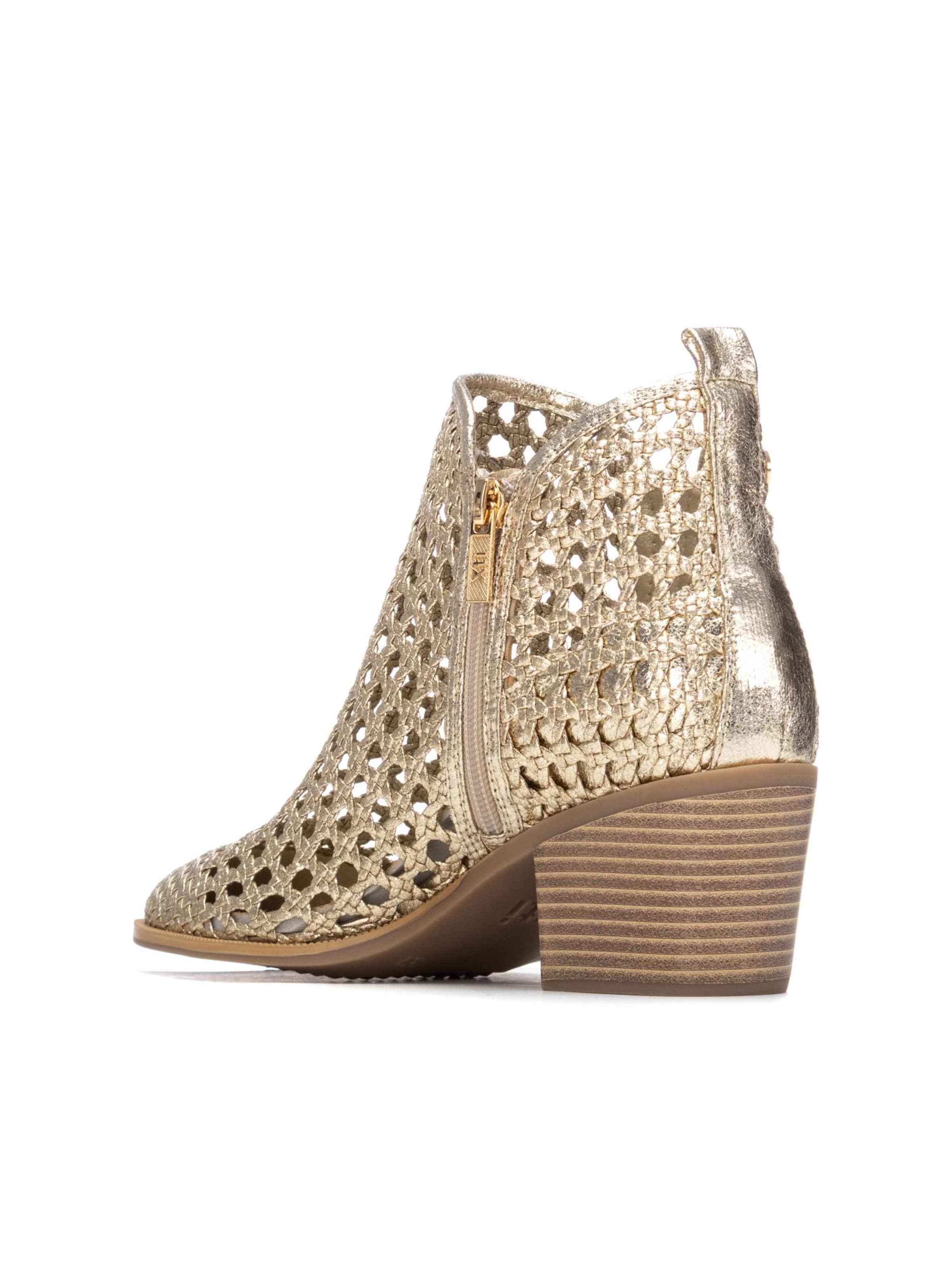 Xti - Botines en oro