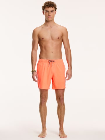 Shiwi Kratke kopalne hlače 'MIKE' | oranžna barva