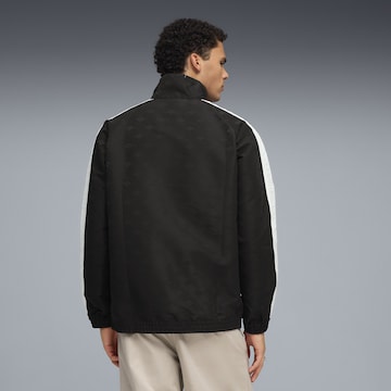 PUMA Trainingsjacke 'T7' in Schwarz