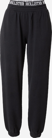 HOLLISTER Tapered Trousers in Black: front