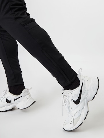 NIKE Slim fit Workout Pants in Black