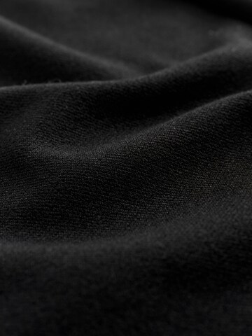 Next Tapered Housut värissä musta