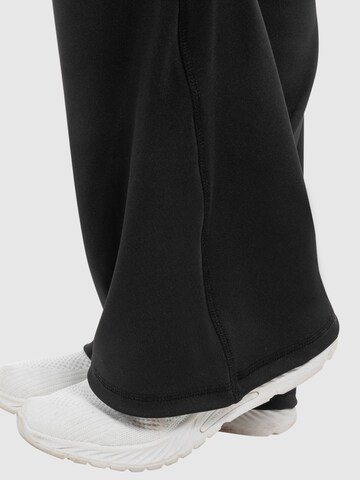 évasé Pantalon de sport ' Loreen ' Smilodox en noir