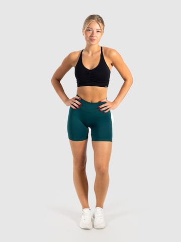 Smilodox Slimfit Sportbroek 'Phelia' in Groen