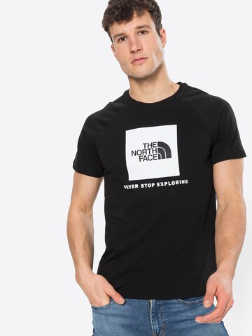 THE NORTH FACE Regularny krój Koszulka w kolorze czarny: przód