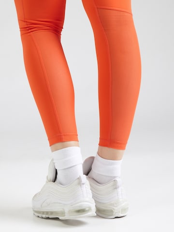 NIKE Skinny Παντελόνι φόρμας 'Pro' σε πορτοκαλί
