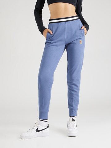 Effilé Pantalon de sport NIKE en bleu : devant