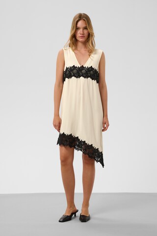 SOAKED IN LUXURY - Vestido em bege: frente