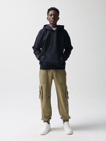 NoWear Zúžený strih Nohavice - Zelená: predná strana