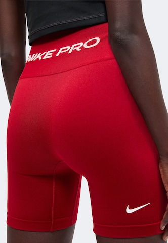NIKE Skinny Sportnadrágok 'Nike Pro' - piros