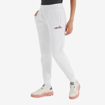 ELLESSE Tapered Pants in White: front