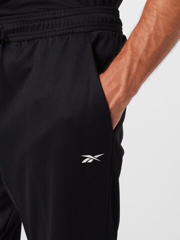 Regular Pantalon de sport Reebok en noir