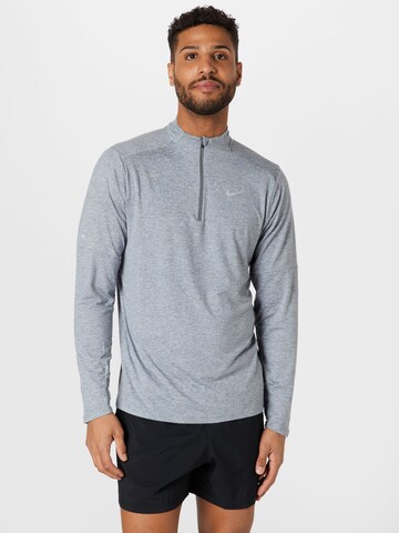 NIKE Sport sweatshirt i grå: framsida