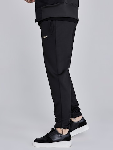 Loosefit Pantaloni di SikSilk in nero