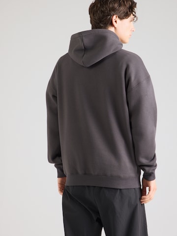 RIP CURL - Sudadera 'RIP SCRIPT HOOD' en negro