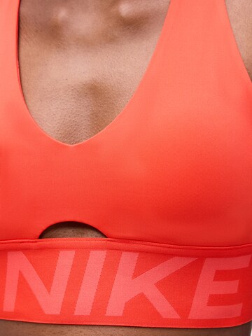 NIKE Μπουστάκι Αθλητικό σουτιέν σε πορτοκαλί