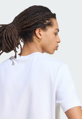 ADIDAS SPORTSWEAR - Camiseta funcional en blanco