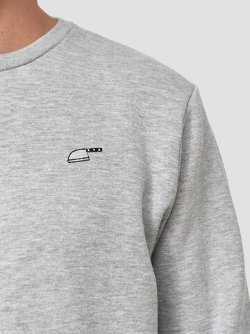 Mikon Pullover 'Messer' in Grau