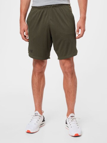 Regular Pantaloni sport de la UNDER ARMOUR pe verde: față