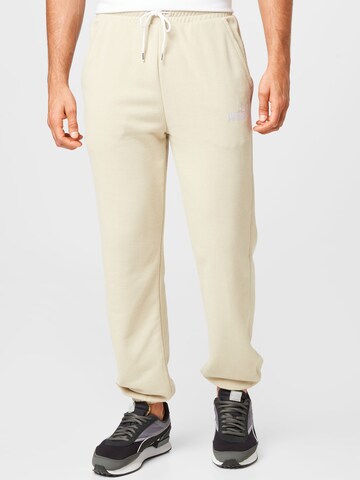 Effilé Pantalon de sport PUMA en beige : devant