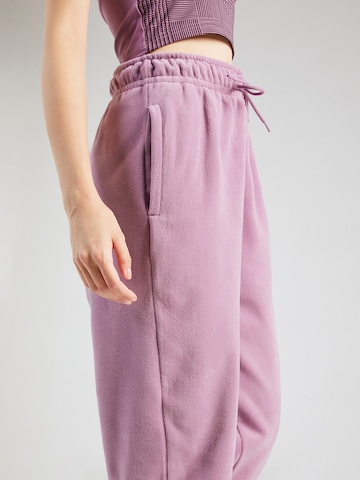 Effilé Pantalon de sport 'ONE' NIKE en violet