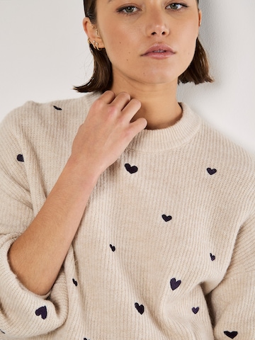 Pull-over ' ' Apricot en gris