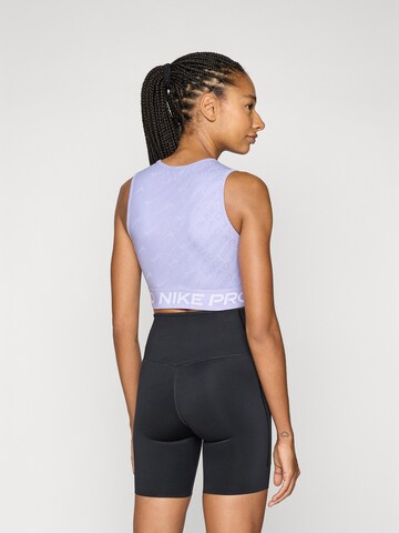 NIKE Спортивный топ в Лиловый