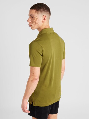 GUESS Poloshirt 'NOLAN' in Grün