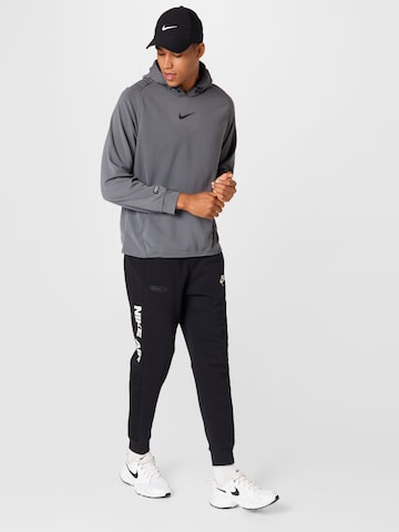 Effilé Pantalon 'Air' Nike Sportswear en noir