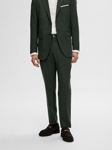 Slimfit Pantaloni con piega frontale 'SLHOASIS' di SELECTED HOMME in verde: frontale