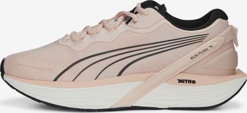 Chaussure de course 'XX Nitro' PUMA en rose : devant