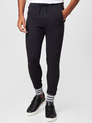 Michael Kors Tapered Trousers in Black: front