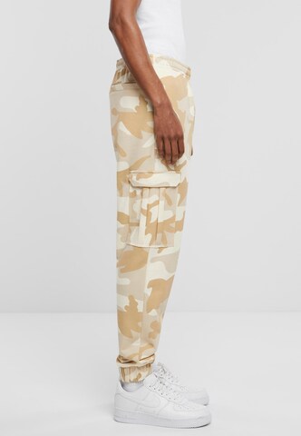Urban Classics - Tapered Pantalón cargo en beige