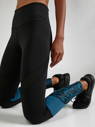 Skinny Pantalon de sport 'Slash' HKMX en bleu
