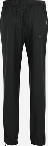 Effilé Pantalon RAINS en noir