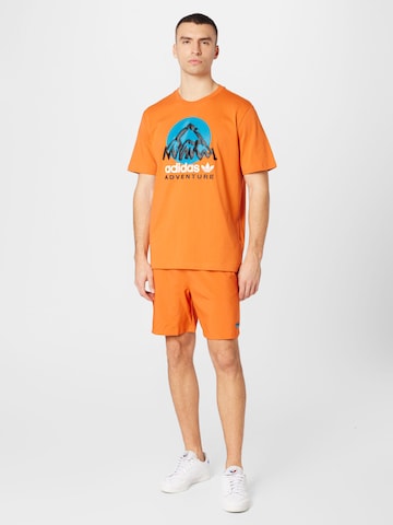 oranžinė ADIDAS ORIGINALS Standartinis Kelnės 'Adventure '