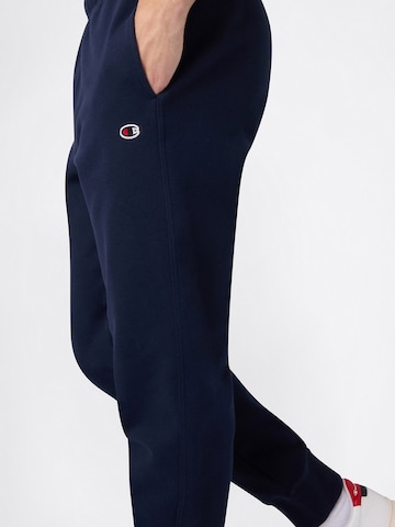 Tapered Pantaloni de la Champion Authentic Athletic Apparel pe albastru