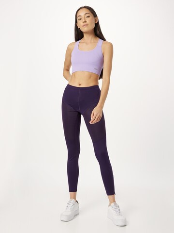 Skinny Pantaloni sportivi di ASICS in lilla