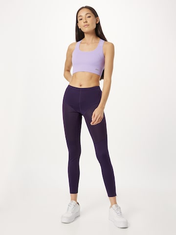 Skinny Pantalon de sport ASICS en violet