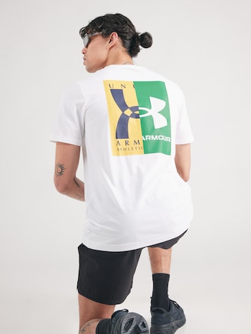 Tricou funcțional de la UNDER ARMOUR pe alb: față