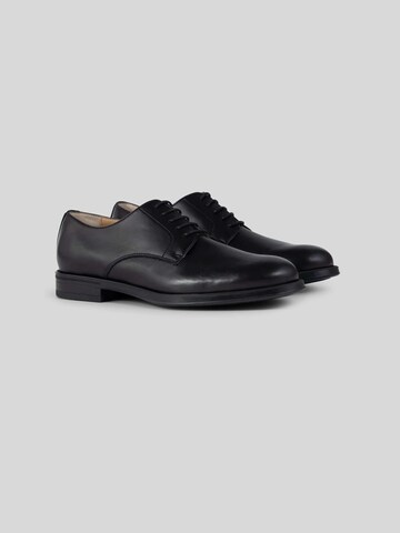 Chaussure à lacets Solari Milano en noir
