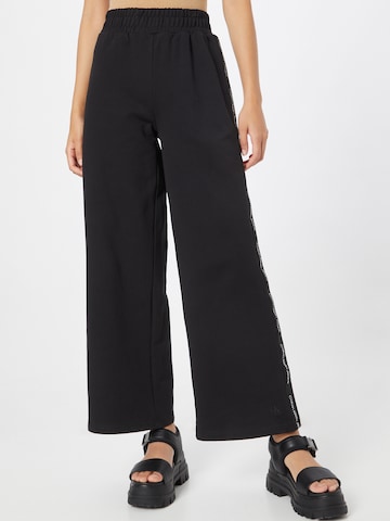 Calvin Klein Jeans Široke hlačnice Hlače | črna barva: sprednja stran