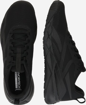 Reebok Jooksujalats 'NFX TRAINER', värv must