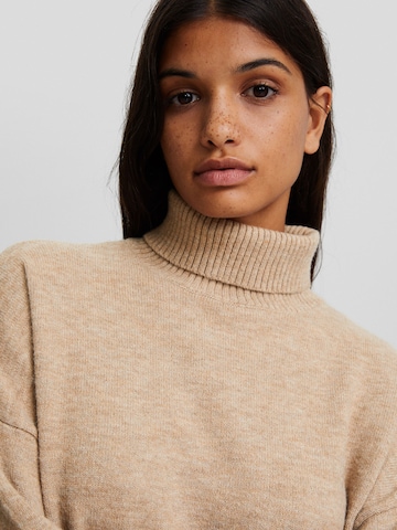 Bershka Stickad klänning i beige