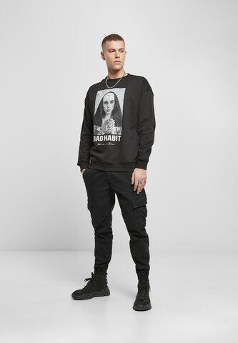 Mister Tee Regular Fit Sweatshirt 'Bad Habit' in Schwarz