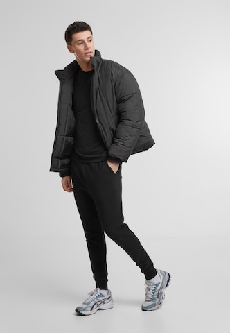 Tapered Pantaloni di Mister Tee in nero